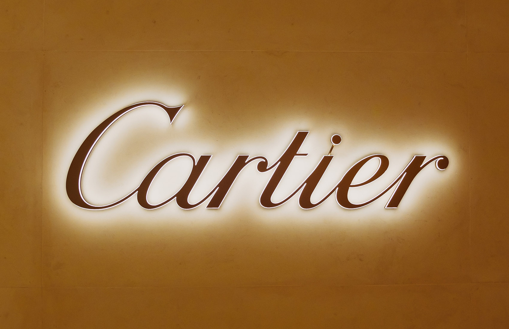 neon cartier logo
