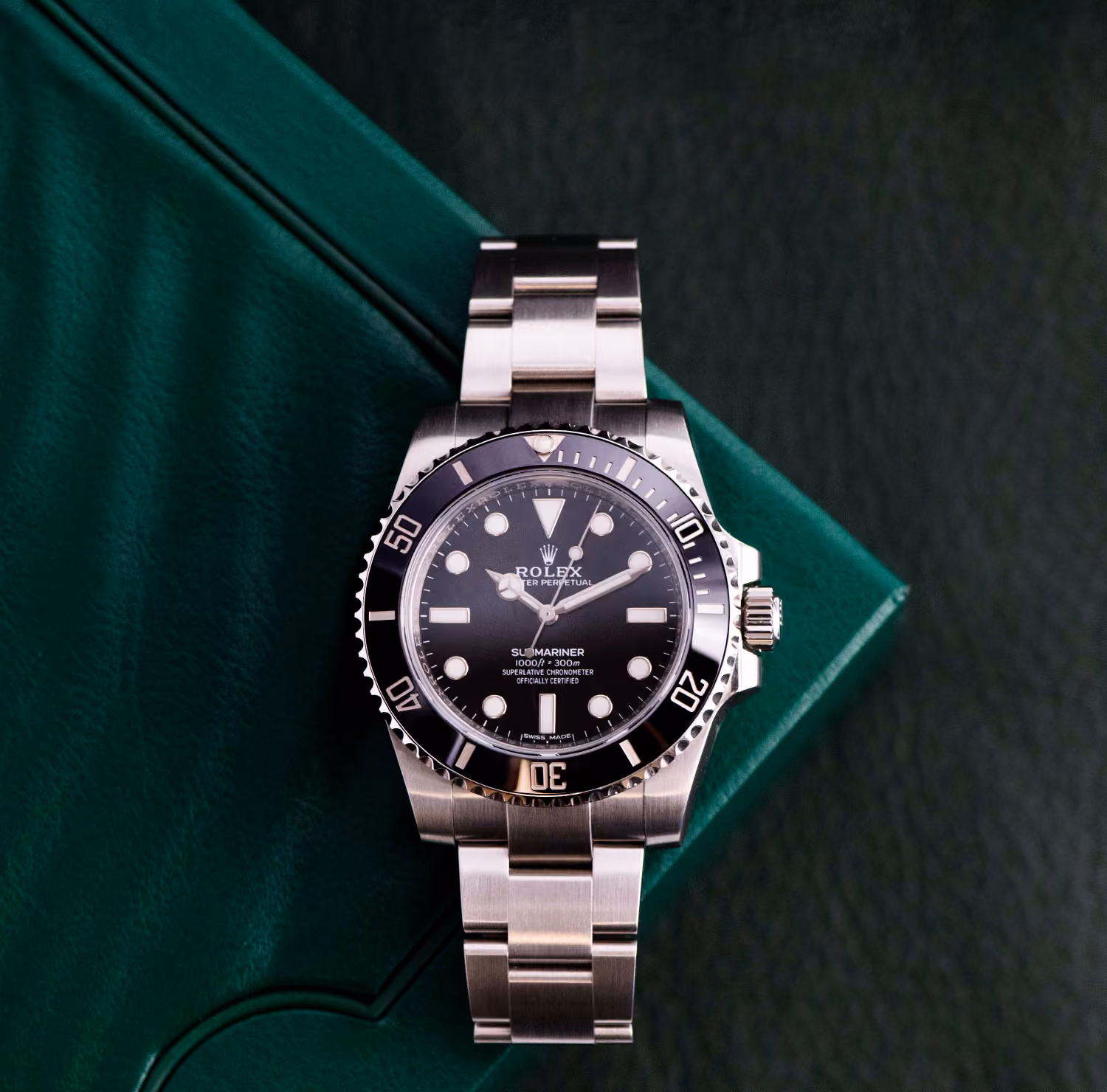 rolex submariner on green watch box