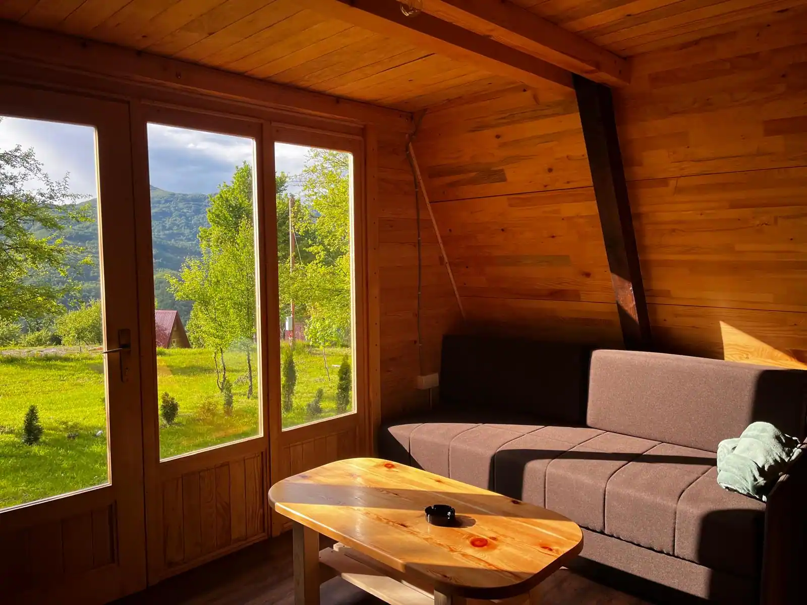 A frame cabin inside golden hour