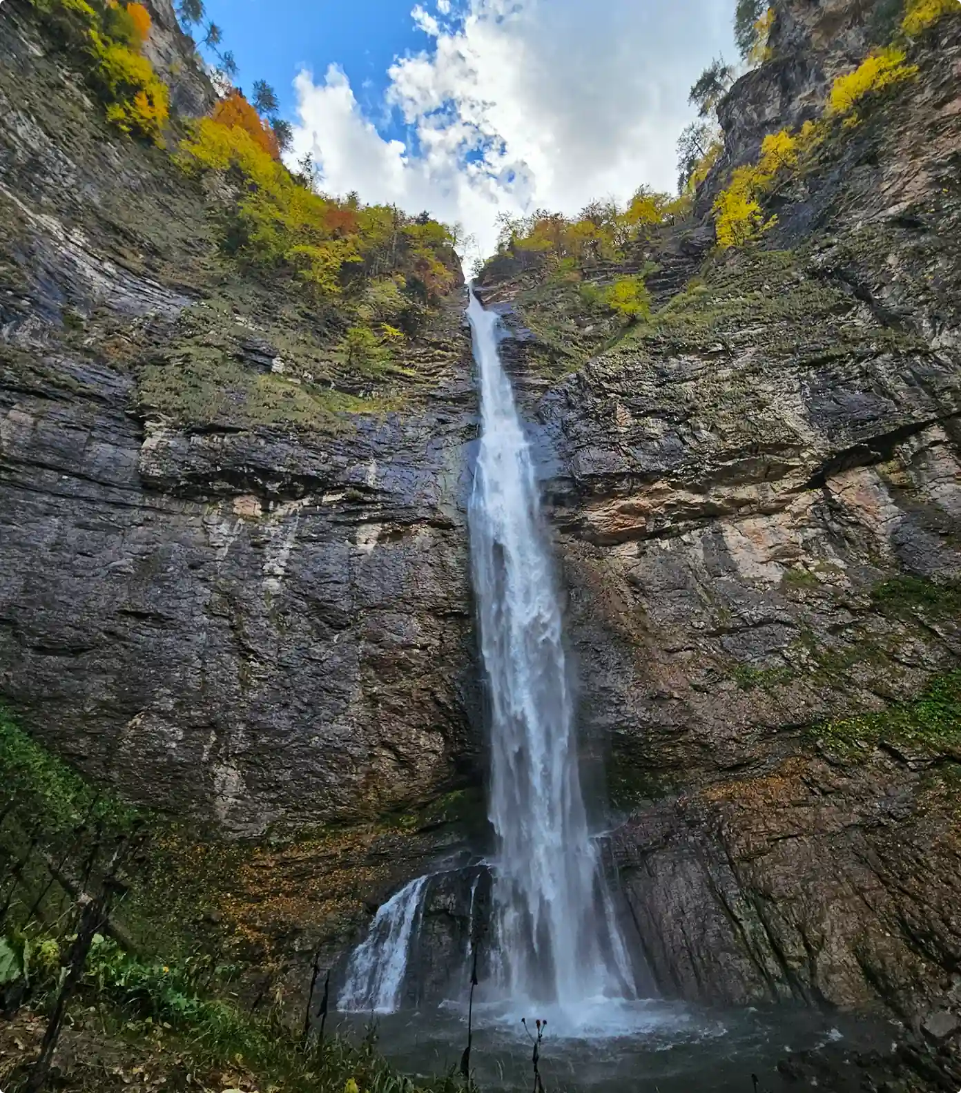 Perucica ancient rainforest waterfall in fall Bosnia
