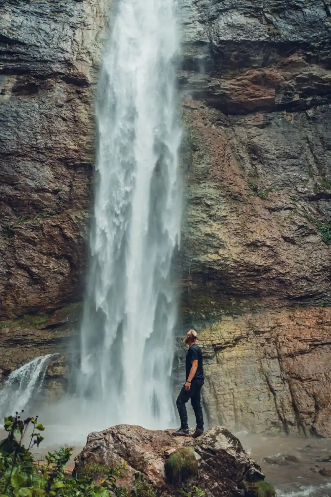 Man beside Skakavac waterfall