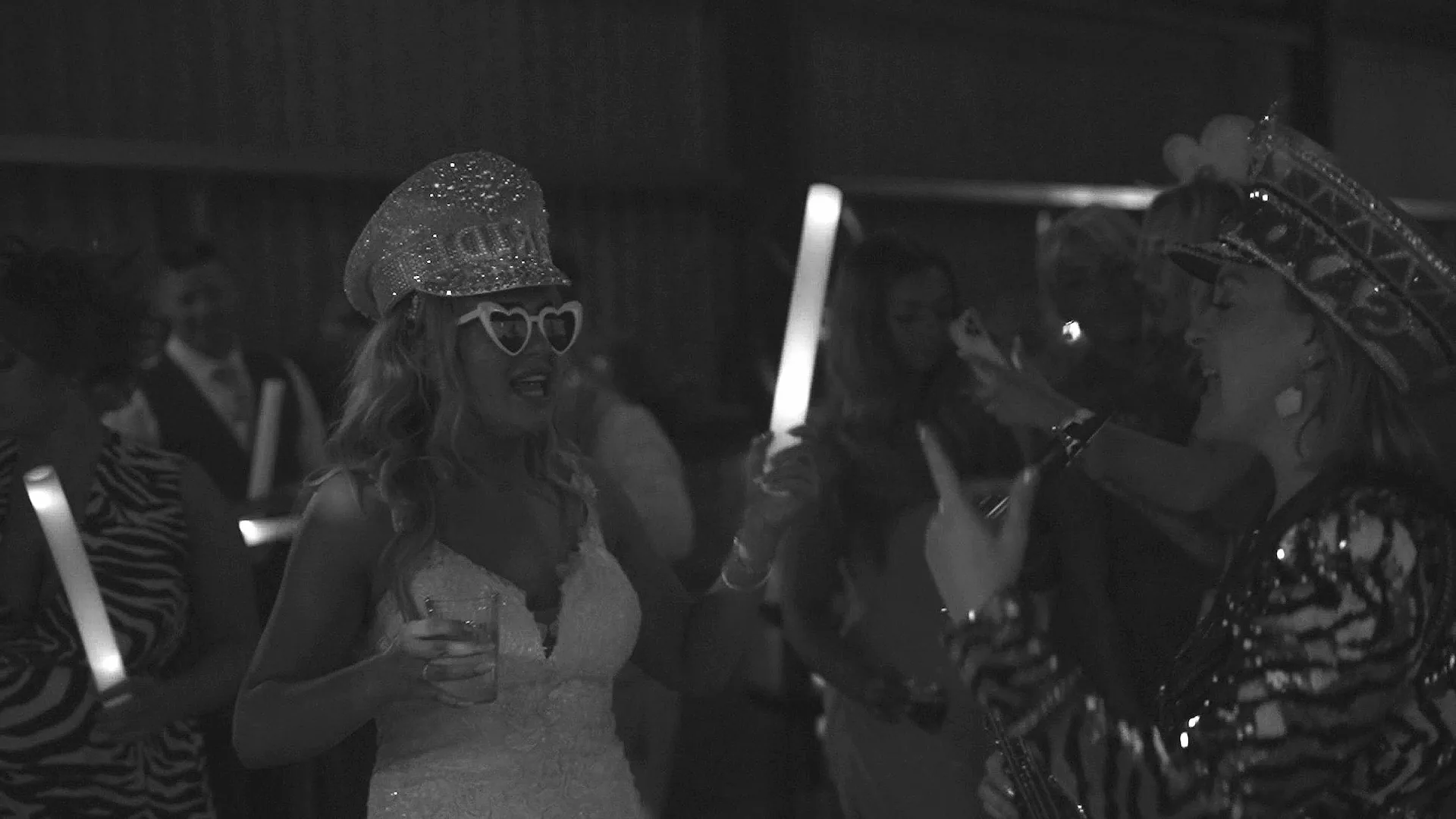 cat from saxophonique at the giraffe shed interacting with the bride at the wedding