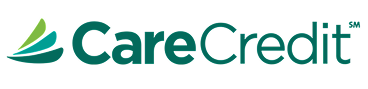 CareCredit company logo in teal and green with stylized leaf design.