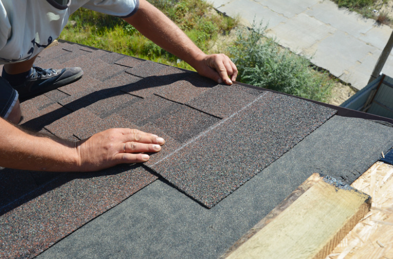 image of roofing contractor at work