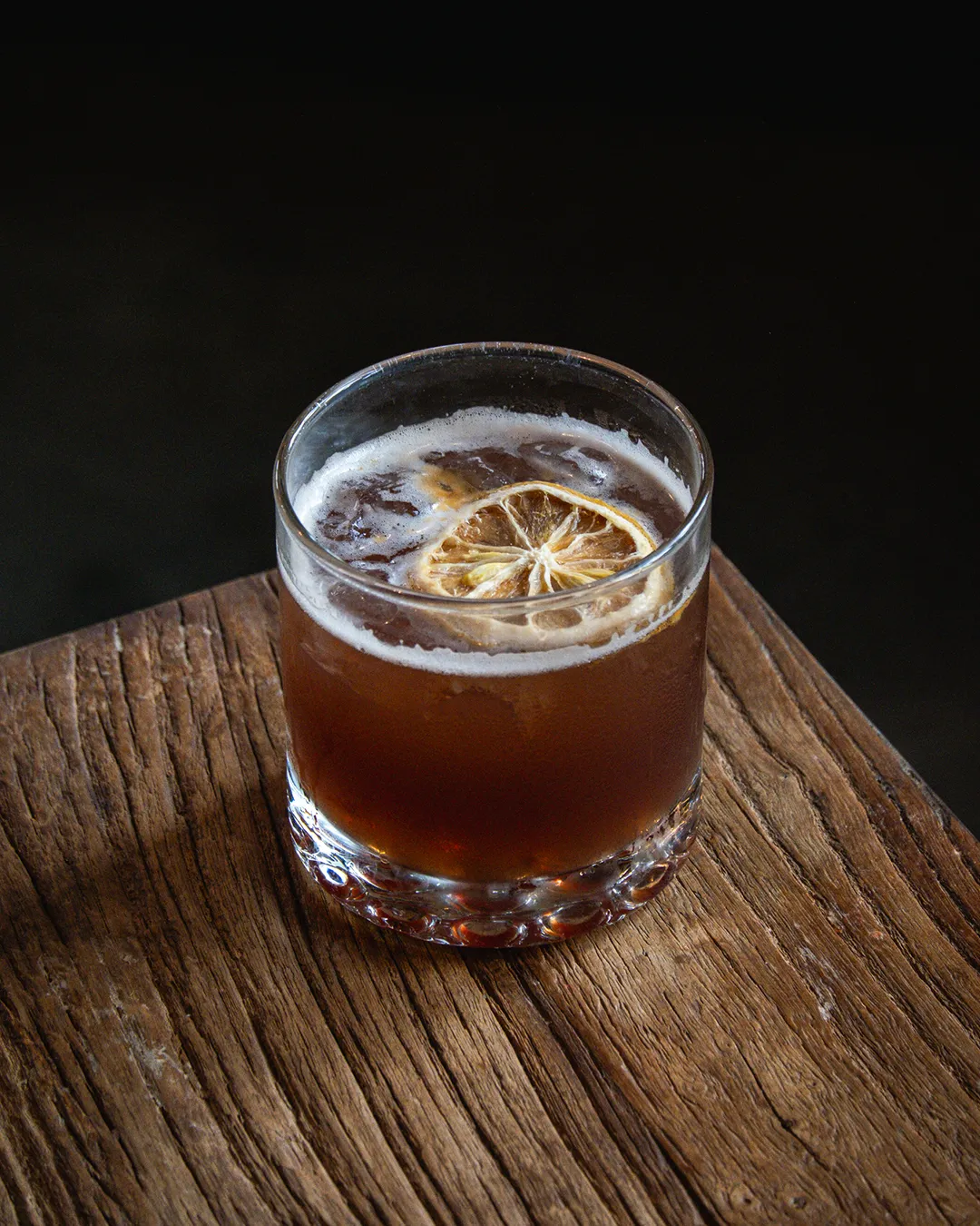 Spicy rye and sweet vermouth layered with dark cherry and citrus, finished with a rich smoky depth.
