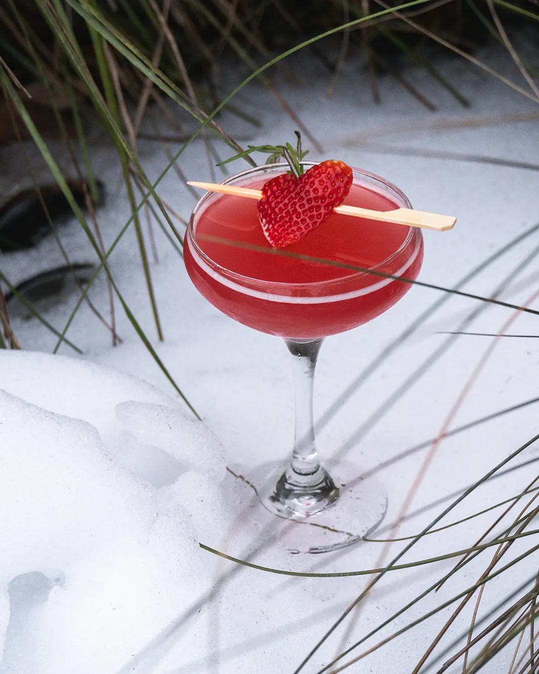 Bright citrus and warm spice layered with herbal rosemary for a bold, elegantly mischievous sip.