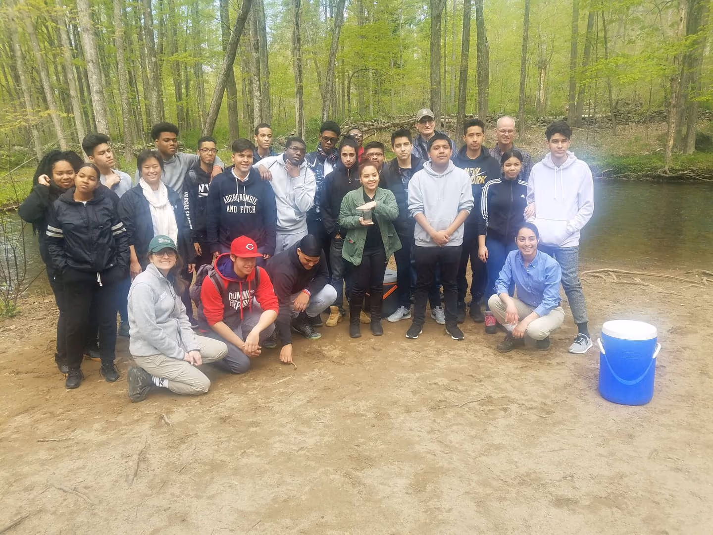 Students and teachers posing together during outdoor nature field trip