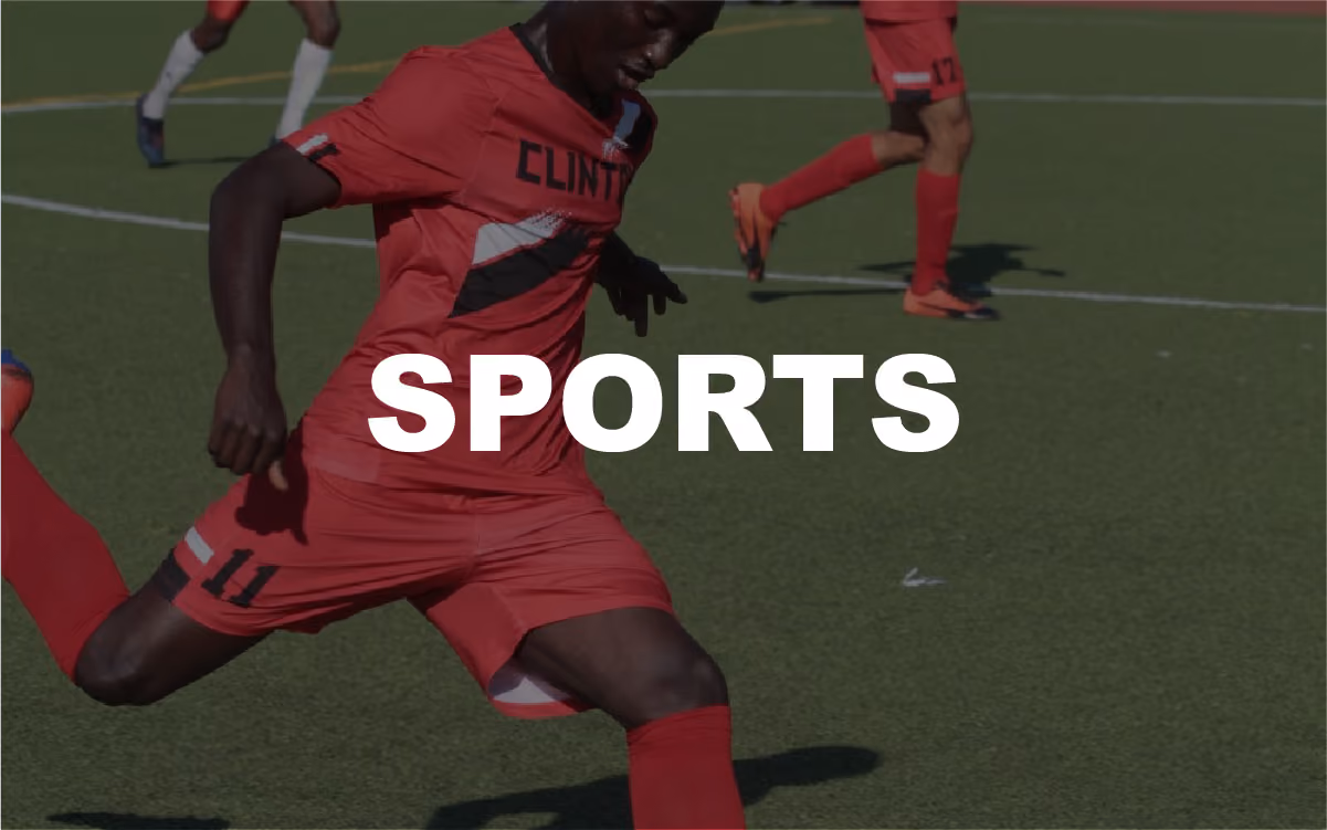 Clinton High School soccer player number 11 dribbling during a match