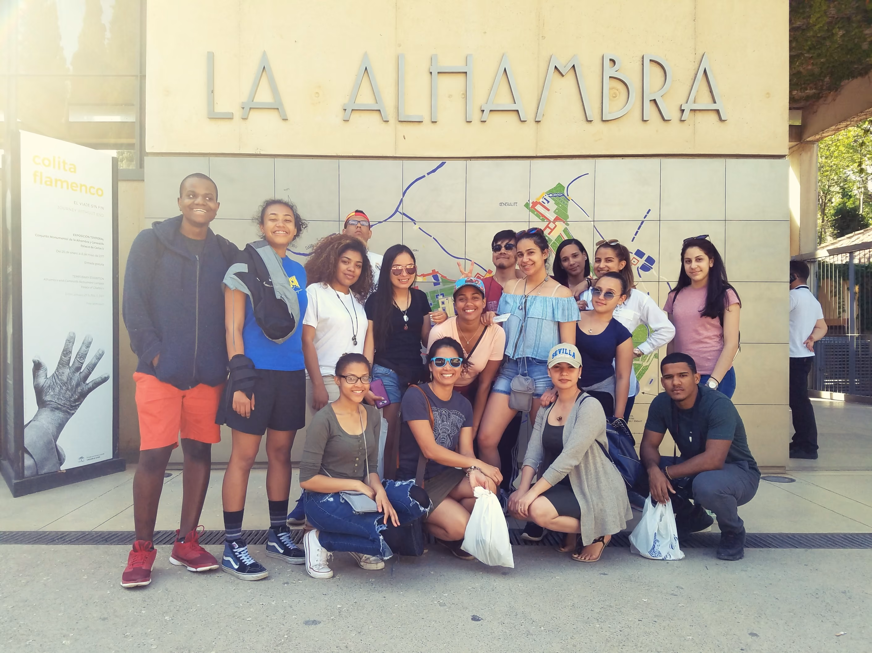 Students posing together at La Alhambra entrance in Spain