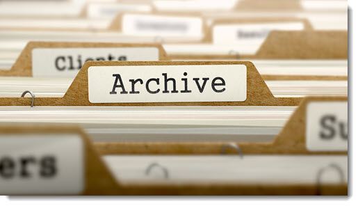 Filing folders in a drawer with Archive tab in focus
