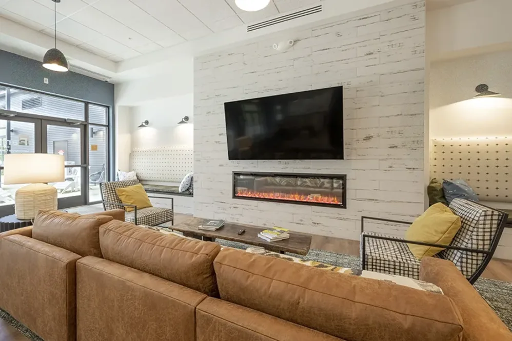 Clubhouse with lounge seating and computer