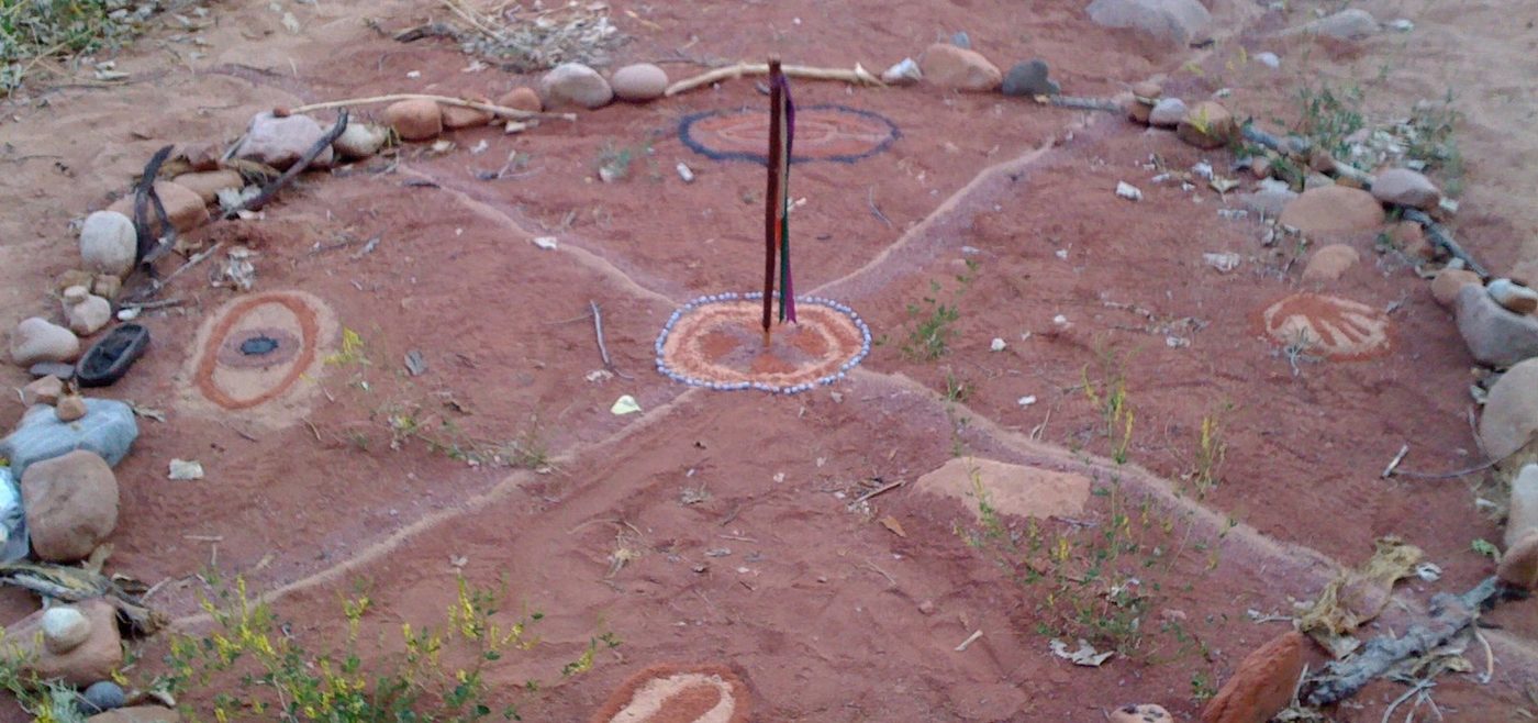A ceremony circle marked out on red earth