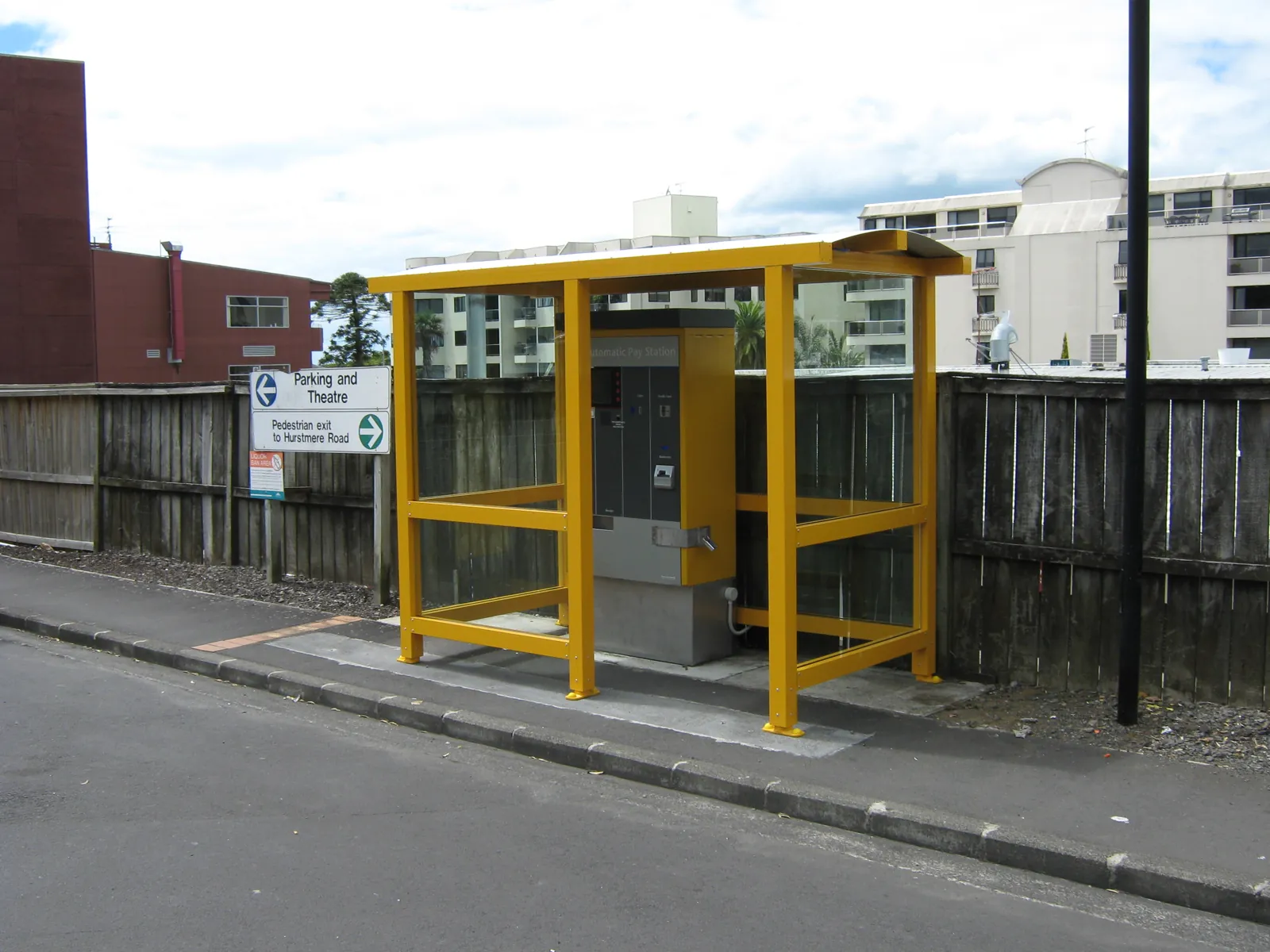 Shelter covering a ticketing machine