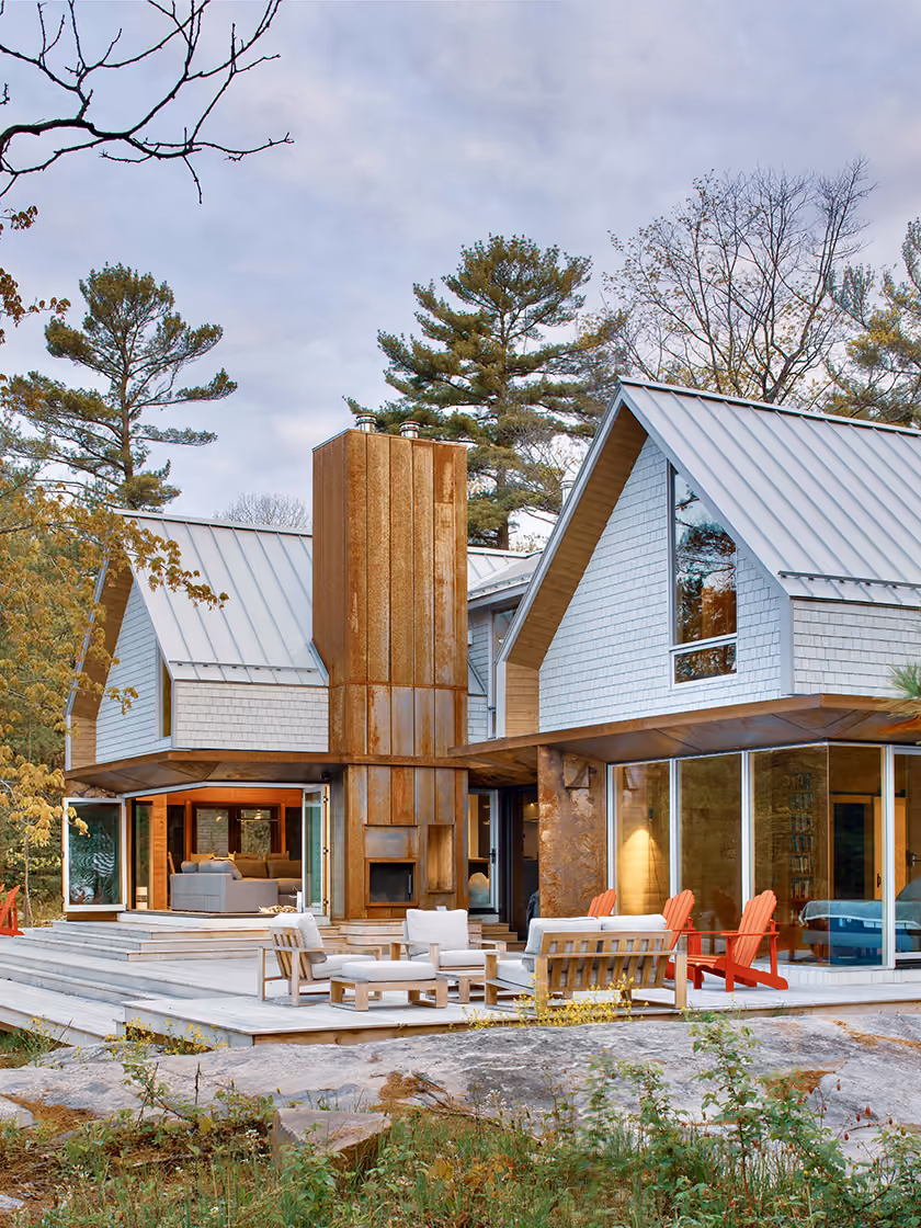 A wide-angle view of a Scandinavian-style cottage.