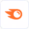 Orange comet icon with a shining star in the center on a white background.