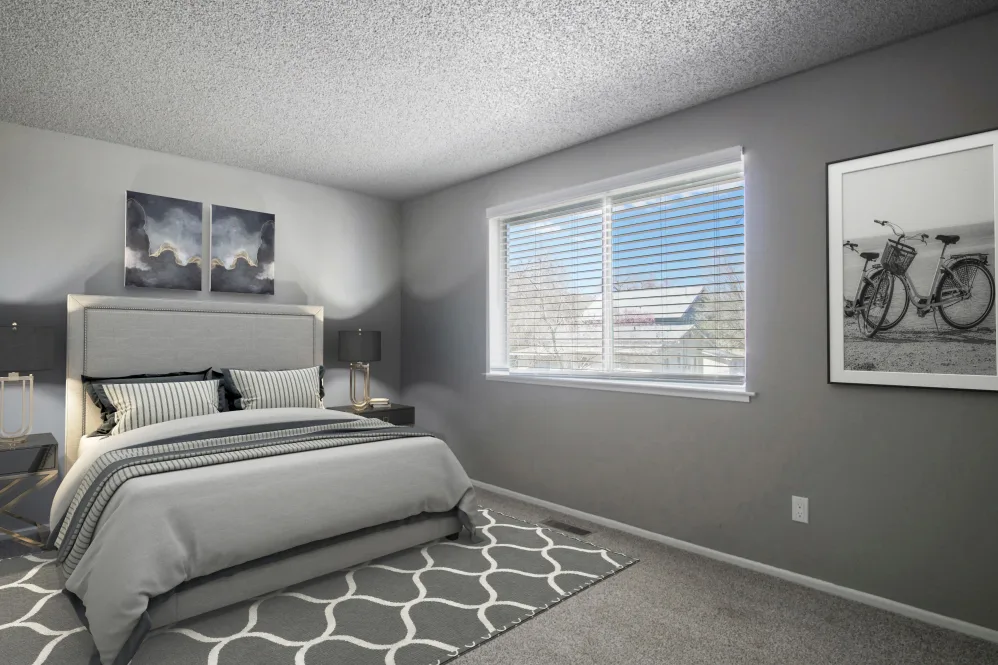 Virtually furnished bedroom with bed, rug, and large window