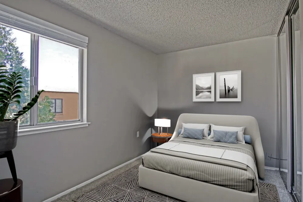 Virtually furnished bedroom with bed, rug, and large window