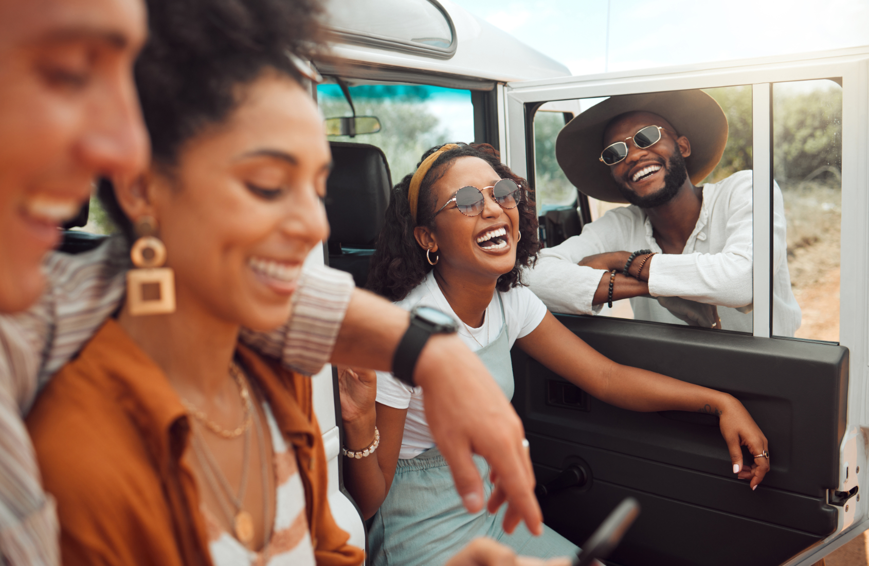 Friends posing near car stock image