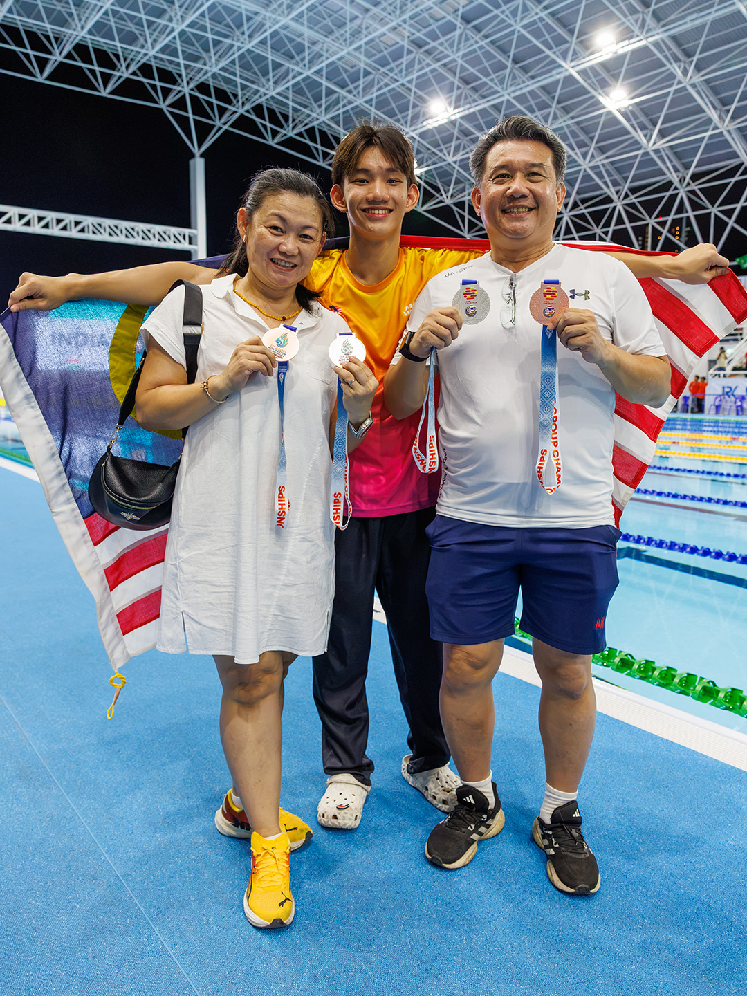 Koo Shyann with his parents