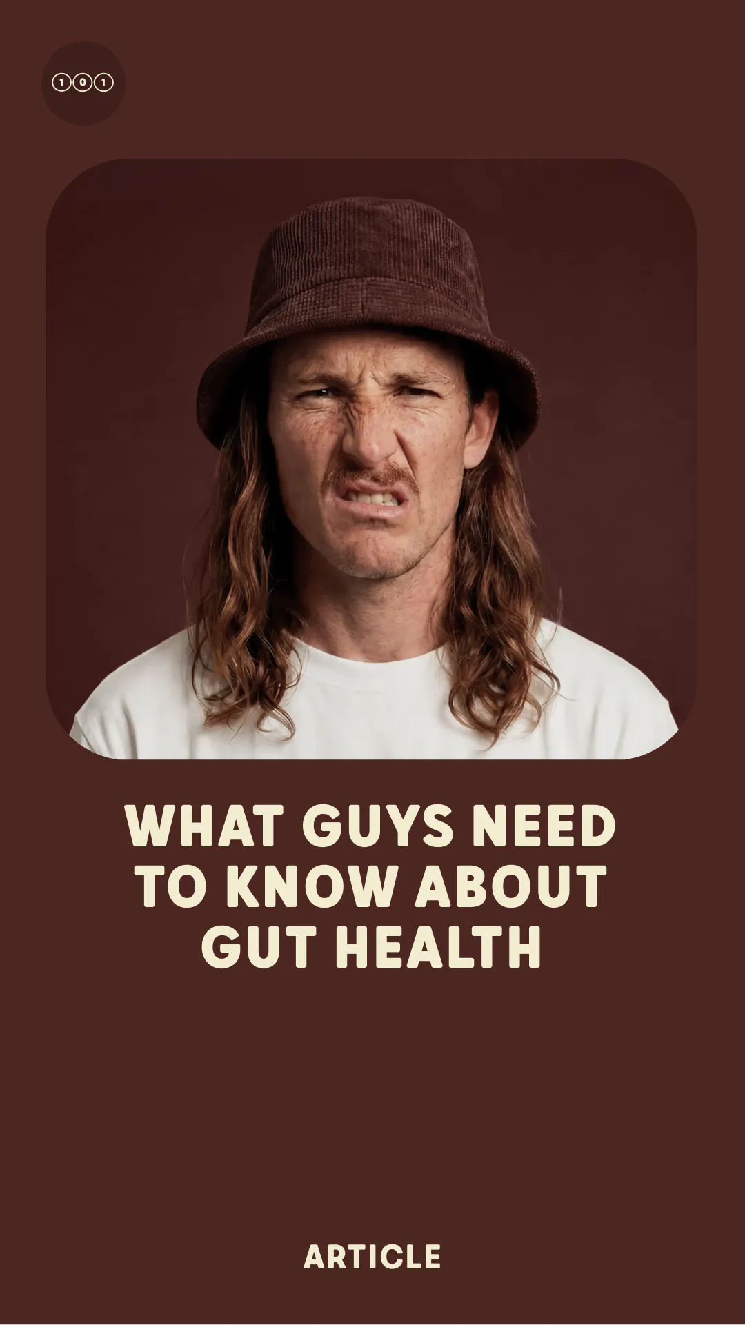 Man with long hair and mustache wearing a brown hat and white shirt with eyes closed.
