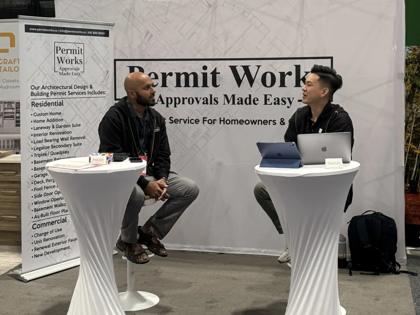 Permit Works team speaking with homeowners and contractors at a home show