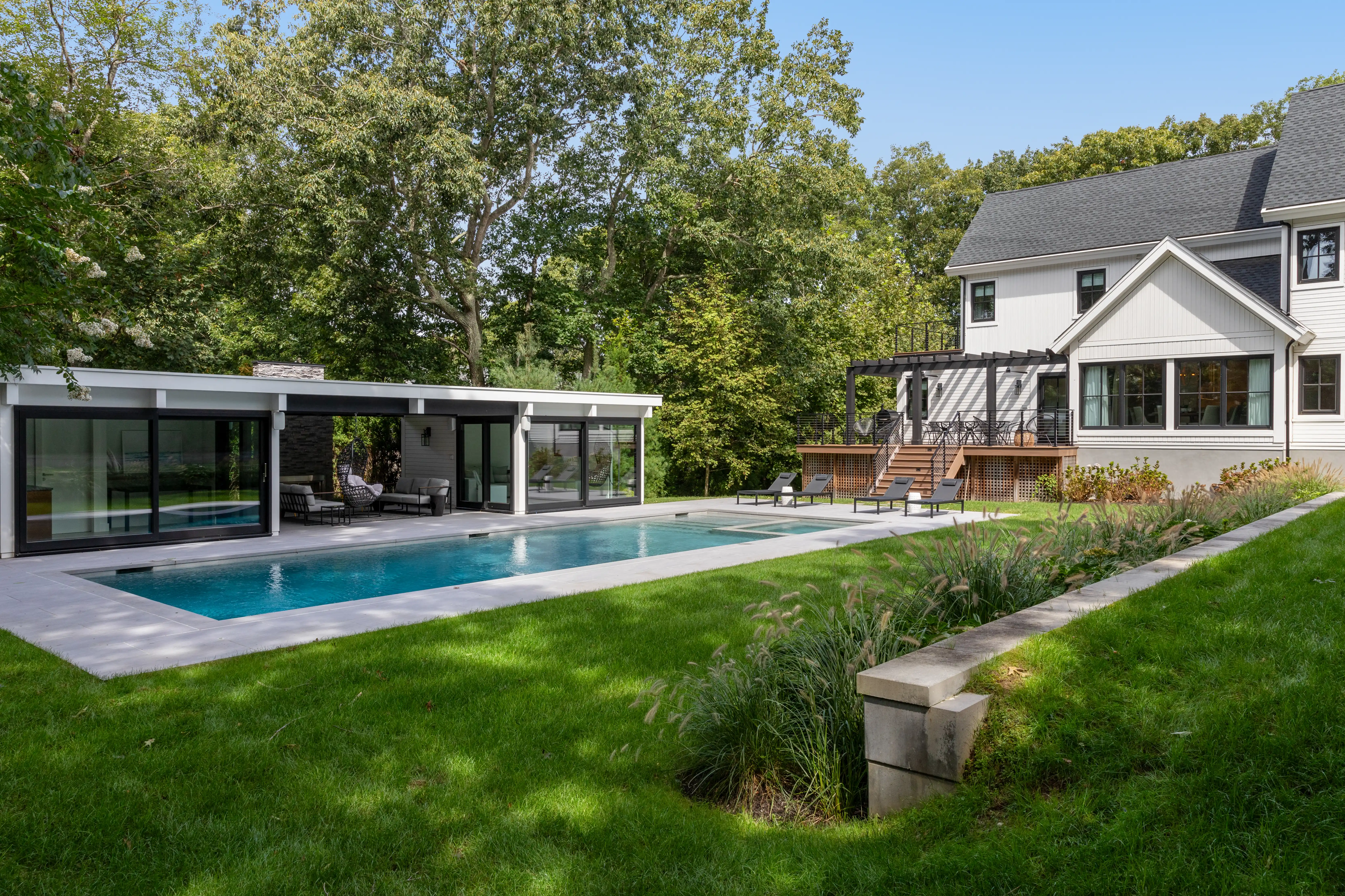 Hamptons residential landscape architecture with modern pool and outdoor living