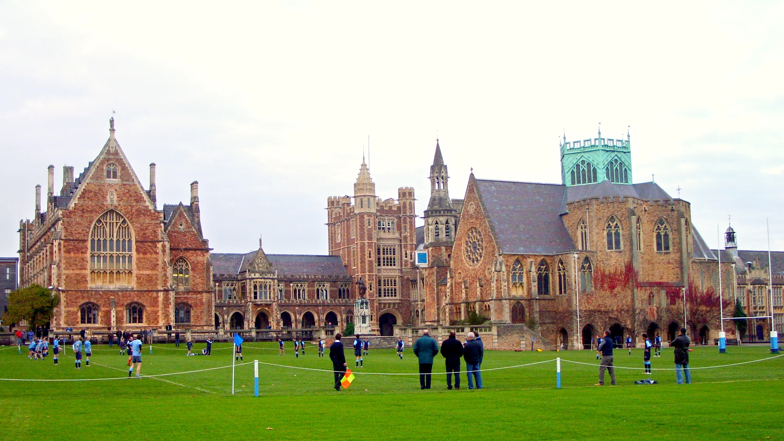 A rugby match on the Close at Clifton College, with Big School and the chapel tower beyond.