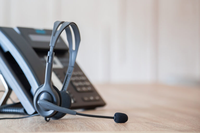 Business desk phone and headset for digital voice services