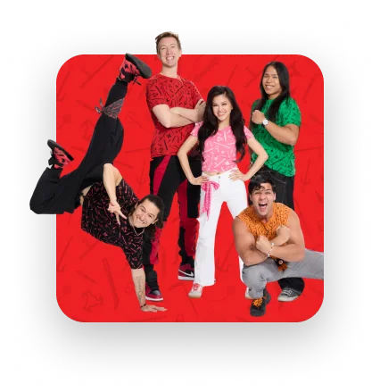 Five people in colorful clothes posing energetically against a red background.