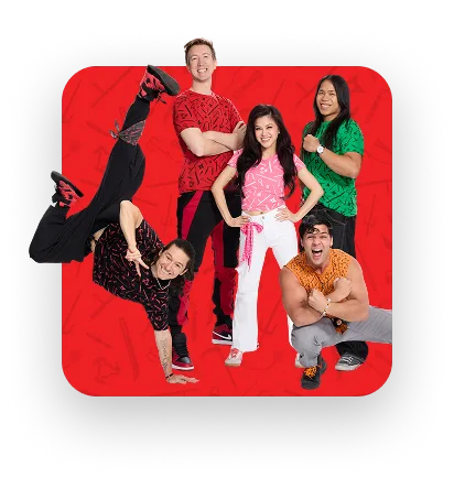 Five people in colorful clothes posing energetically against a red background.
