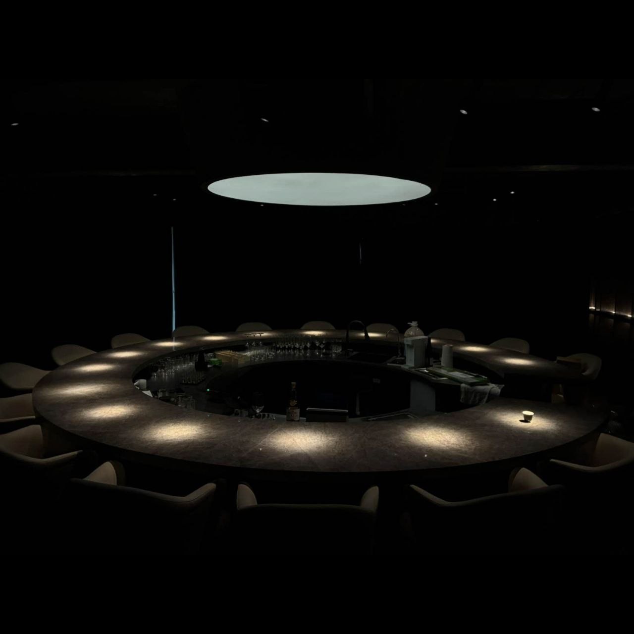 Private Members Bar, Kuala Lumpur — Dramatic Accent Lighting for a Circular Marble Counter