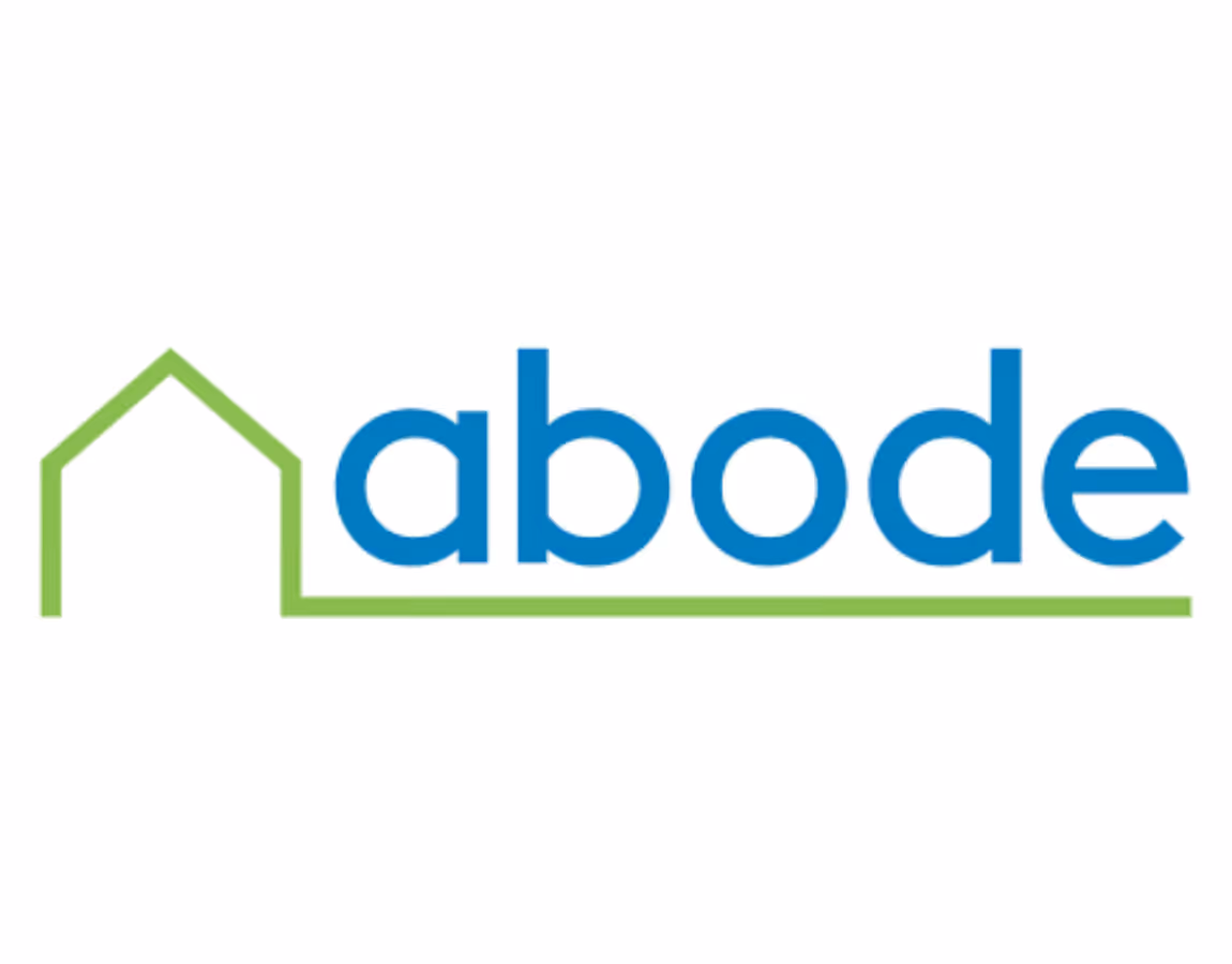Abode logo featuring a green house outline connected to the word 'abode' in blue letters.