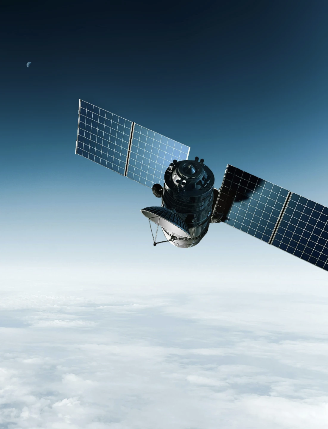 Satellite with solar panels orbiting above Earth clouds with the moon in the background.