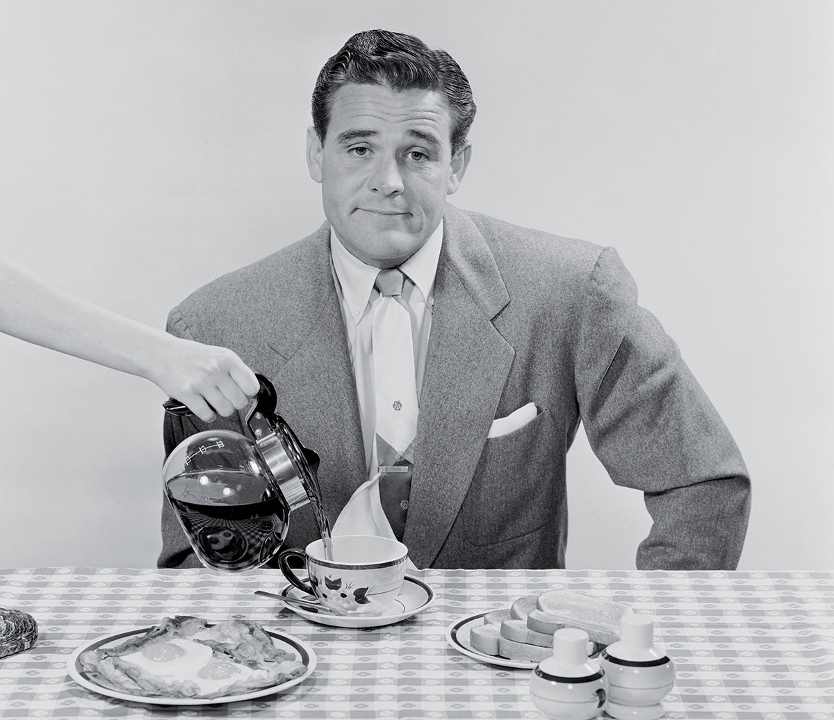 Business man se faisant servir con café