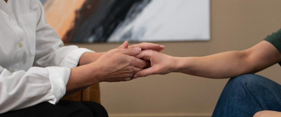 two people holding hands