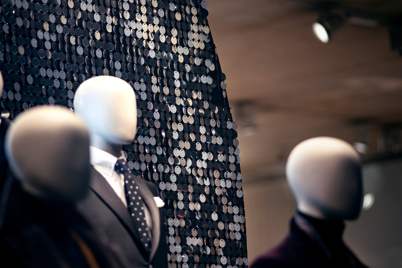 A close view of the black Shimmerwall for a clothing company.