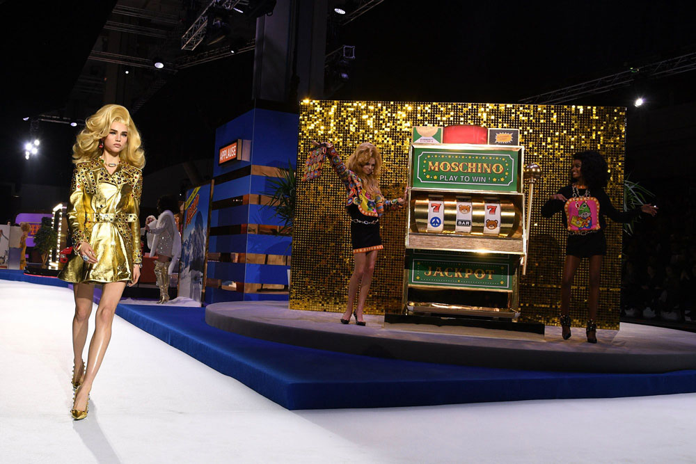 Gold sequin-wall at Milan fashion show for Moschino 