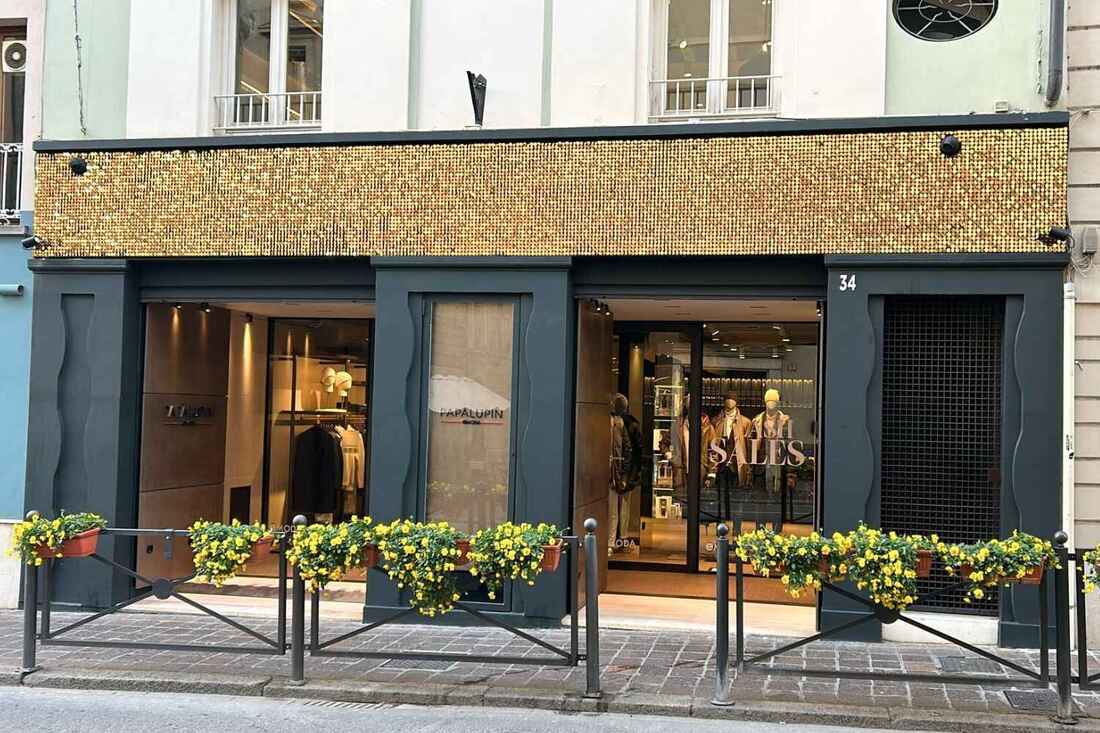 gold sequin display running along top of store