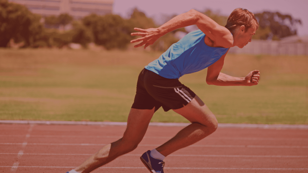 An athlete sprinting towards the finish line during a 5K race, showcasing the importance of a strong finish