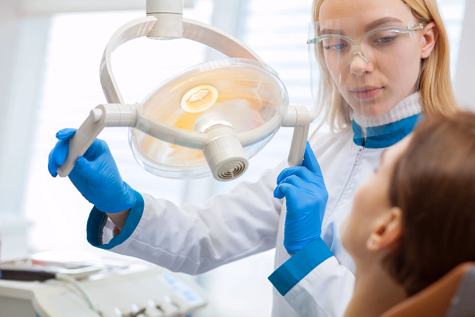 man at the dentist receiving sleep apnea treatment in Huntersville, NC