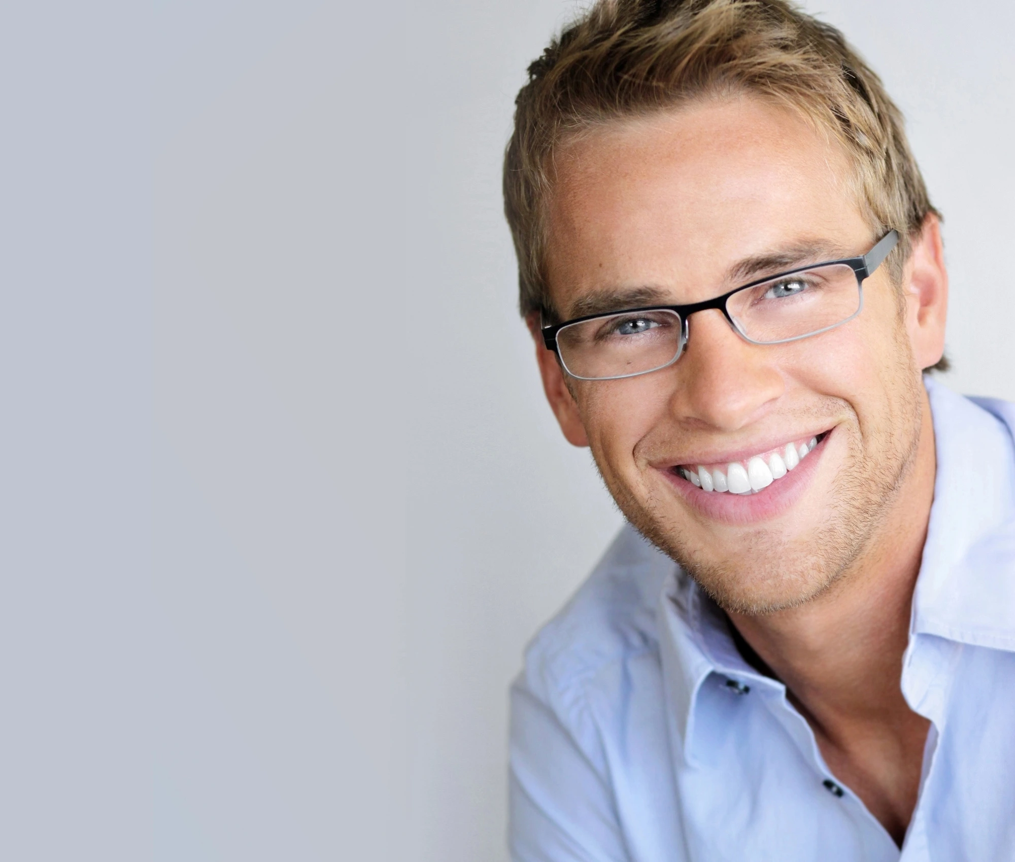 man smiling after using Invisalign in Huntersville