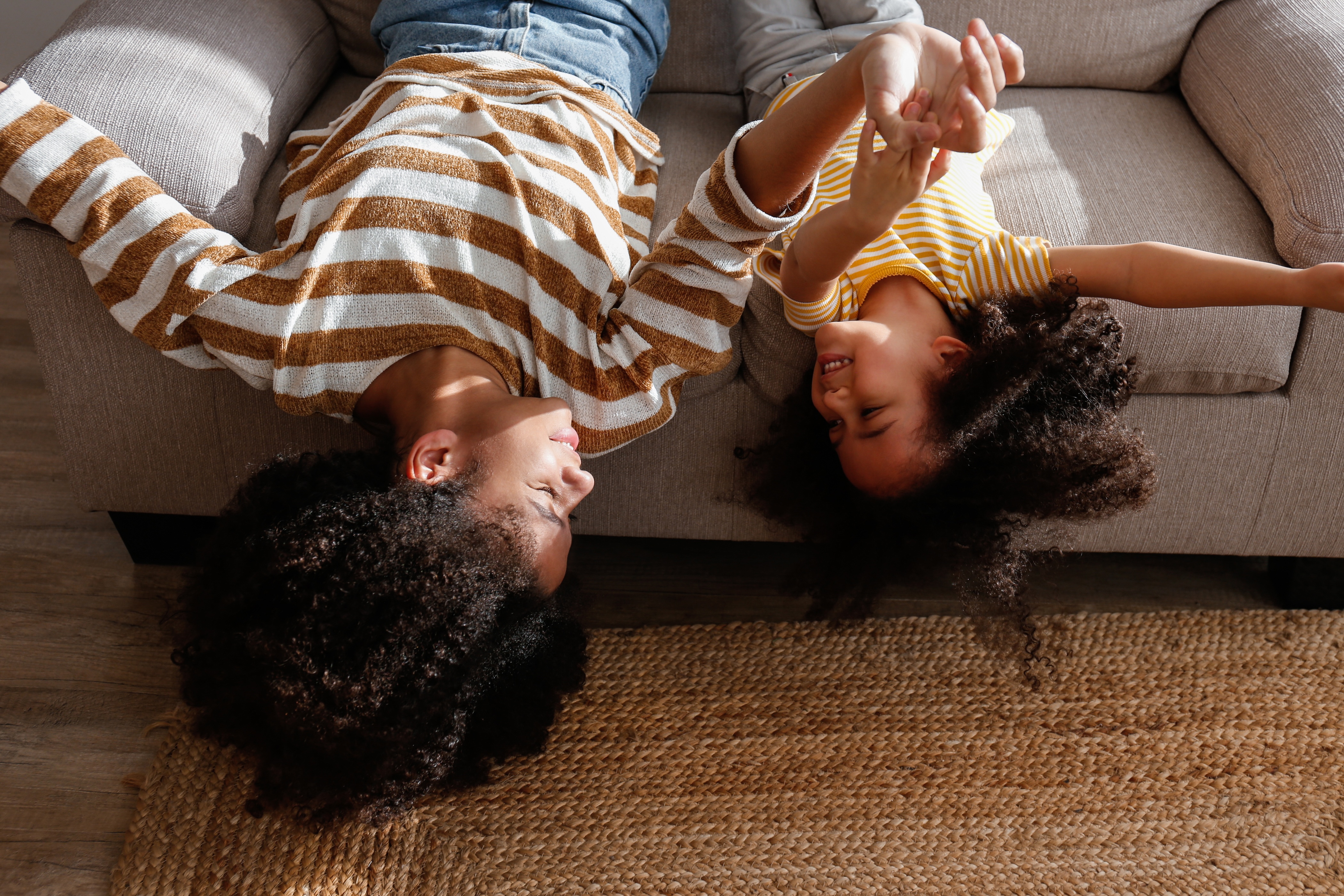woman and girl upside down stock image