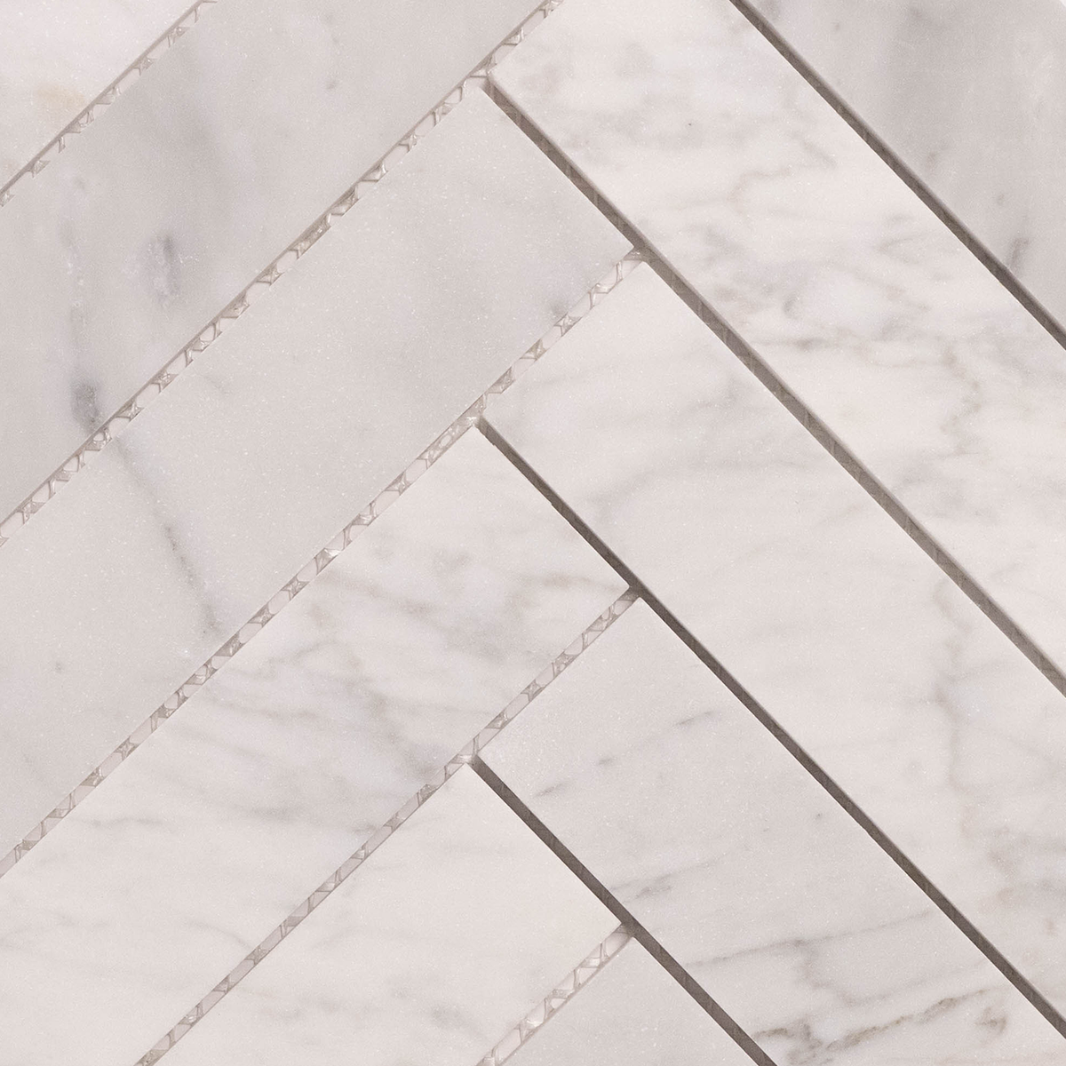 Dune Herringbone Carrara White
