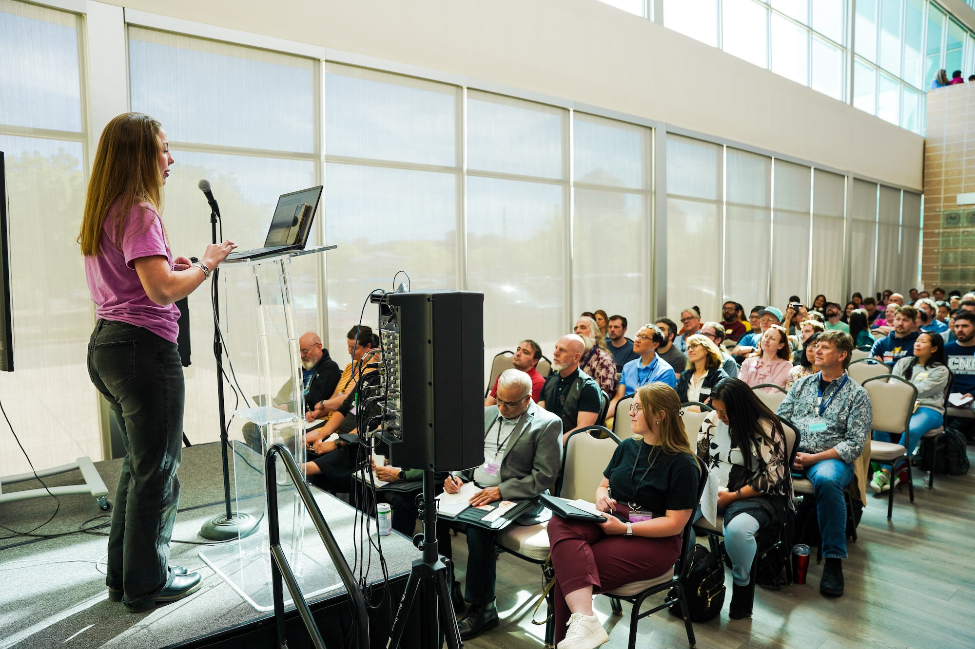 image capturing a creative, interactive exhibit at a humanitarian aid fundraising event, emphasizing modern engagement