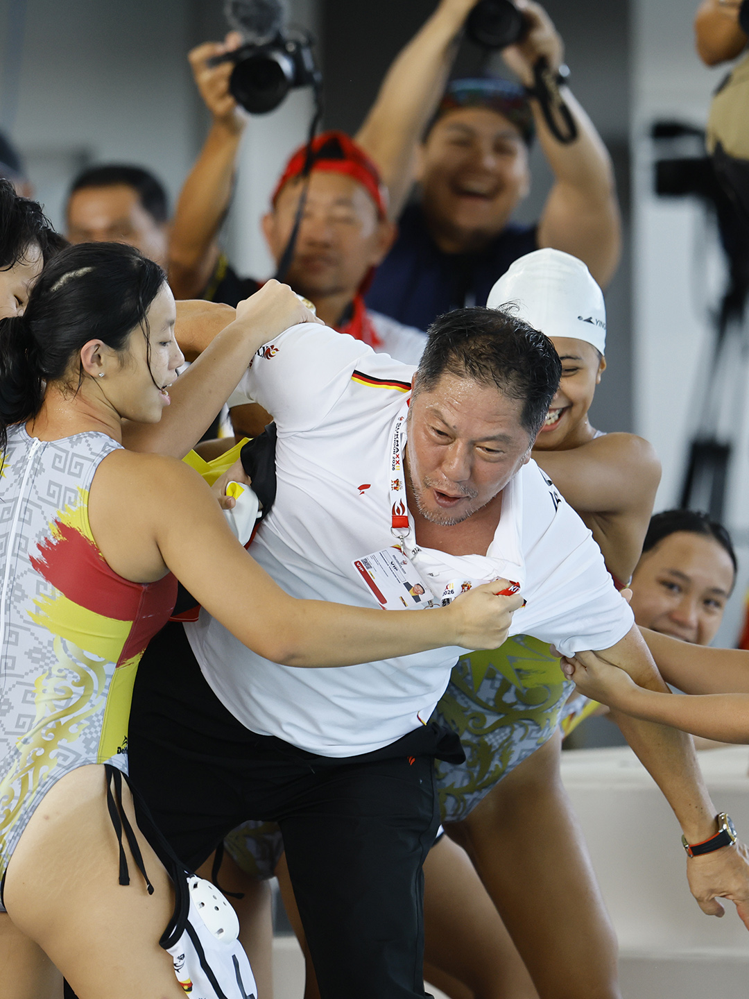 Sarawak's coach celebrates with the team