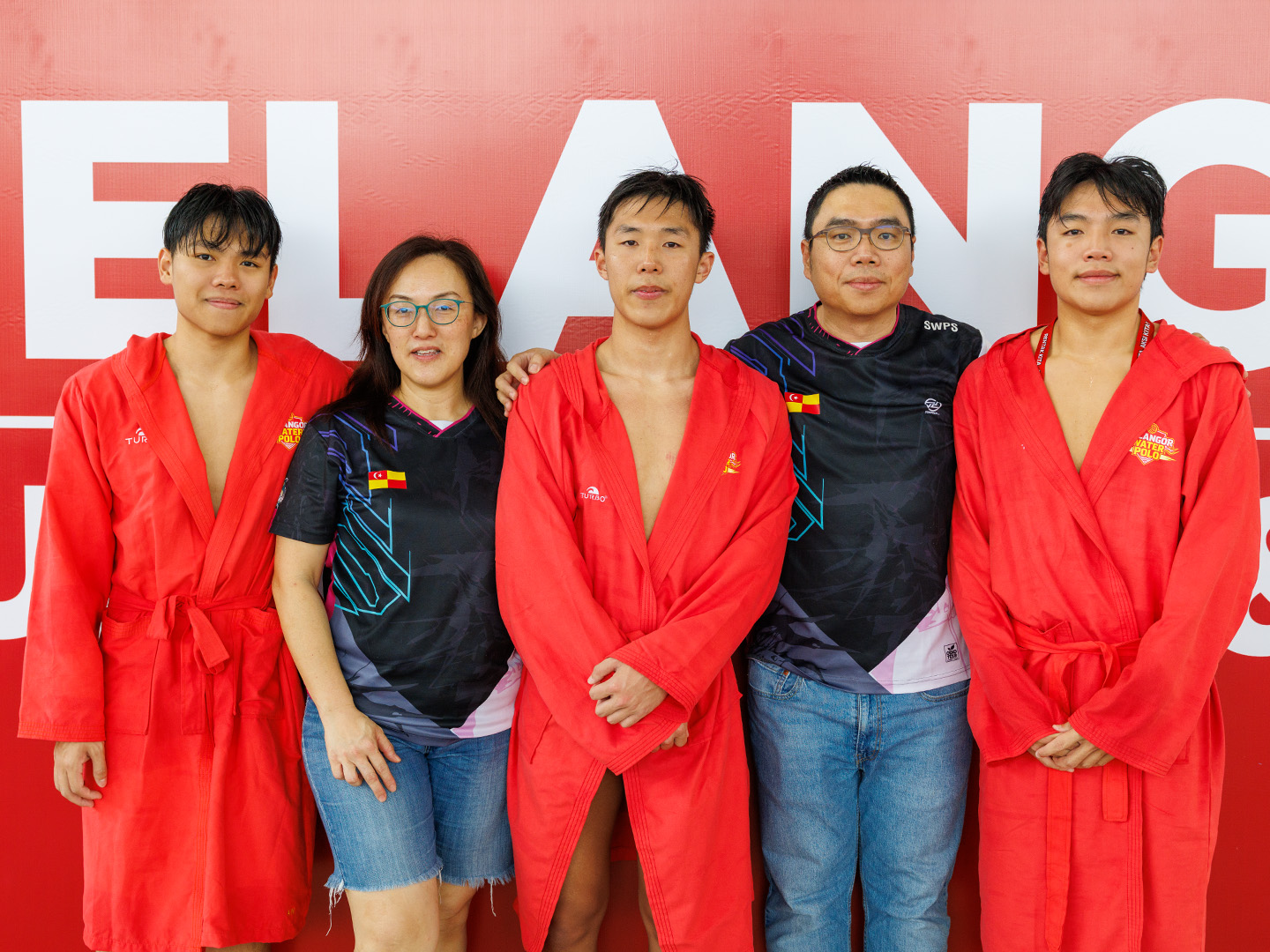The Wong family together after the SUKMA XXII water polo final, Selangor 2026