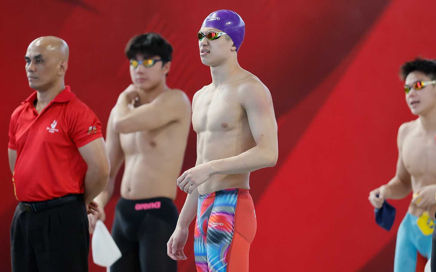 Elson Chun Hong Lee waiting behind the blocks before Penang's relay final