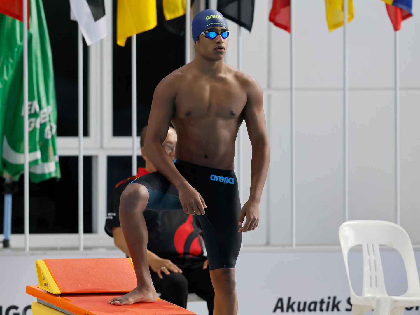 Nishan Christopher Manuel behind the blocks before his race at SUKMA XXII