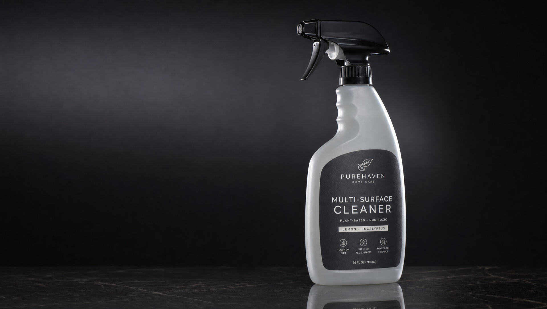 Editorial product photography of premium household product packaging with custom labels — cleaning bottles and home goods on a dark studio canvas with PMS 375 rim lighting
