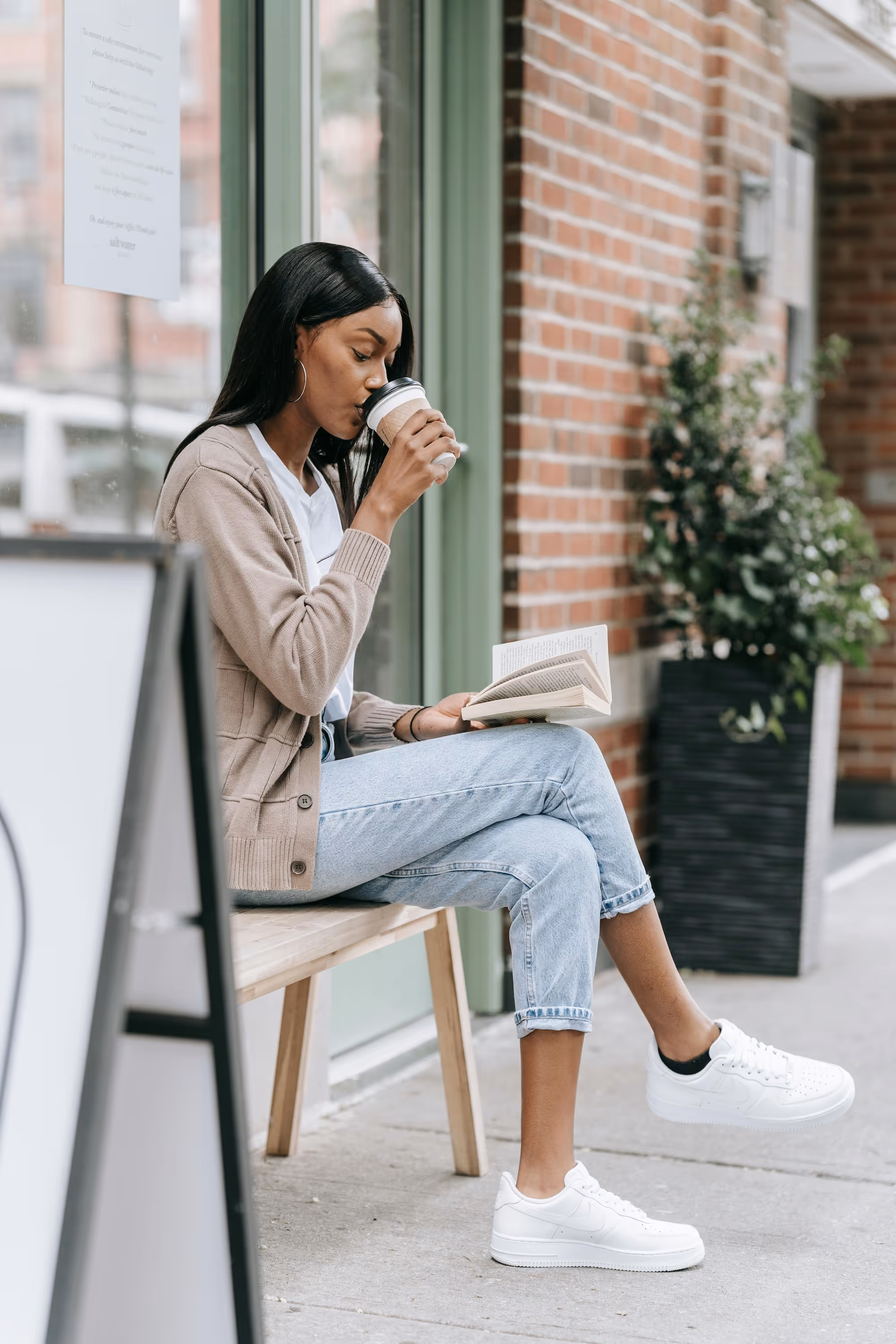 Woman drinking coffee stock image